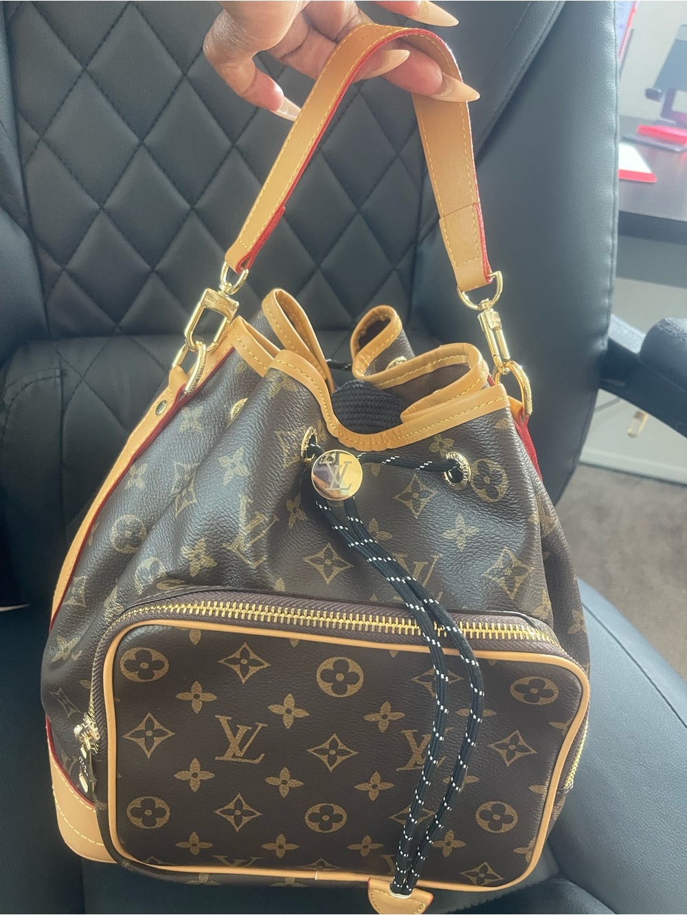 Louis Vuitton Brown Monogram Drawstring Shoulder Bag with Tan Trim and Red Edge